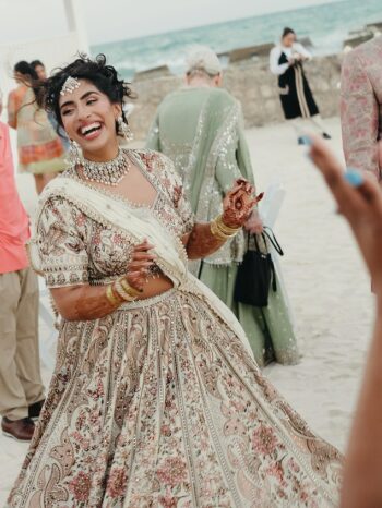 Bride Meha smiles and dances with guests
during her welcome dinner and mehndi celebration at the White Gazebo at
Generations Riviera Maya in Riviera Maya, Mexico. Bride Meha smiles and dances with guests
during her welcome dinner and mehndi celebration at the White Gazebo at
Generations Riviera Maya in Riviera Maya, Mexico.