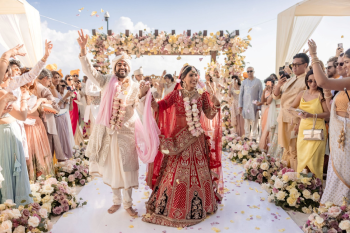 Sheina and Dhruv's Indian wedding ceremony at El Dorado Royale, showing how a wedding venue accommodates a large guest count while maintaining comfort, visibility, and guest experience. Sheina and Dhruv's Indian wedding ceremony at El Dorado Royale, showing how a wedding venue accommodates a large guest count while maintaining comfort, visibility, and guest experience.