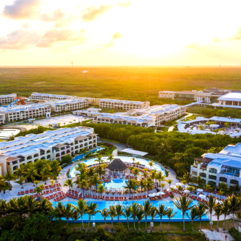 Aerial view of Moon Palace The Grand - Cancun, a luxury all-inclusive resort in Mexico featuring expansive pools, tropical landscaping, and resort amenities that make it a popular choice for Indian destination weddings and multi-day wedding celebrations. Aerial view of Moon Palace The Grand - Cancun, a luxury all-inclusive resort in Mexico featuring expansive pools, tropical landscaping, and resort amenities that make it a popular choice for Indian destination weddings and multi-day wedding celebrations.