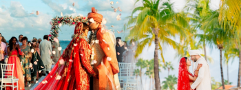 Shomaila and Omer celebrate their Indian destination wedding at Planet Hollywood Cancun as guests shower them with flower petals, alongside a portrait of Dinisha and Geet’s destination wedding beneath palm trees during their wedding at Moon Palace Jamaica. Shomaila and Omer celebrate their Indian destination wedding at Planet Hollywood Cancun as guests shower them with flower petals, alongside a portrait of Dinisha and Geet’s destination wedding beneath palm trees during their wedding at Moon Palace Jamaica.
