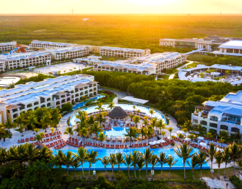 Aerial view of Moon Palace The Grand - Cancun, a luxury all-inclusive resort in Mexico that hosts Indian destination weddings with multiple venues, accommodations, and event spaces. Aerial view of Moon Palace The Grand - Cancun, a luxury all-inclusive resort in Mexico that hosts Indian destination weddings with multiple venues, accommodations, and event spaces.