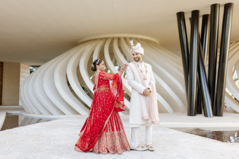 Foram and Vrraj share a first look in traditional Indian wedding attire at Grand Palladium Costa Mujeres before their ceremony in Mexico. Foram and Vrraj share a first look in traditional Indian wedding attire at Grand Palladium Costa Mujeres before their ceremony in Mexico.