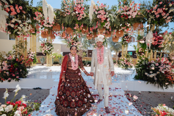 Shivani and Nilan celebrate their Hindu wedding ceremony beneath an elaborate floral mandap at Hard Rock Hotel Los Cabos in Mexico. Shivani and Nilan celebrate their Hindu wedding ceremony beneath an elaborate floral mandap at Hard Rock Hotel Los Cabos in Mexico.