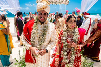 Mahak and Pritam celebrate their Hindu wedding ceremony on the beach at Planet Hollywood Cancun during their Indian destination wedding in Mexico. Mahak and Pritam celebrate their Hindu wedding ceremony on the beach at Planet Hollywood Cancun during their Indian destination wedding in Mexico.