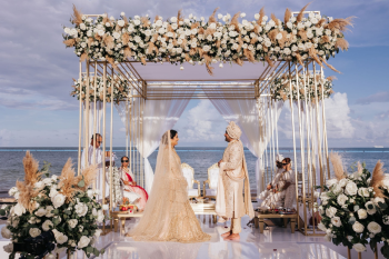 Beachfront Indian wedding mandap ceremony at Moon Palace The Grand overlooking the Caribbean Sea Beachfront Indian wedding mandap ceremony at Moon Palace The Grand overlooking the Caribbean Sea
