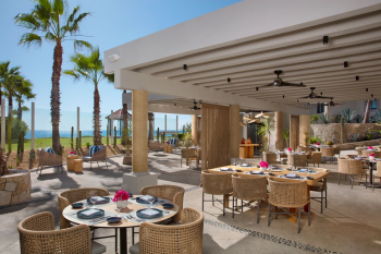Oceanfront dining terrace at Oceana restaurant at Dreams Los Cabos Suites Golf Resort & Spa Oceanfront dining terrace at Oceana restaurant at Dreams Los Cabos Suites Golf Resort & Spa