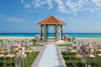 Oceanfront gazebo decorated for a wedding ceremony at Dreams Los Cabos Suites Golf Resort & Spa Oceanfront gazebo decorated for a wedding ceremony at Dreams Los Cabos Suites Golf Resort & Spa