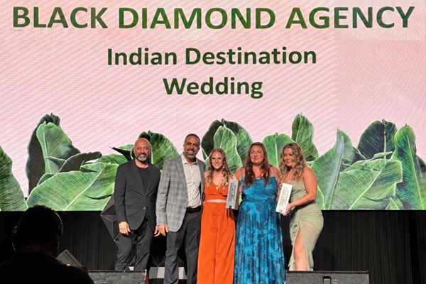 Ateet Ahuja of Indian Destination Wedding receiving the 2026 AIC Hotel Group Black Diamond Agency award